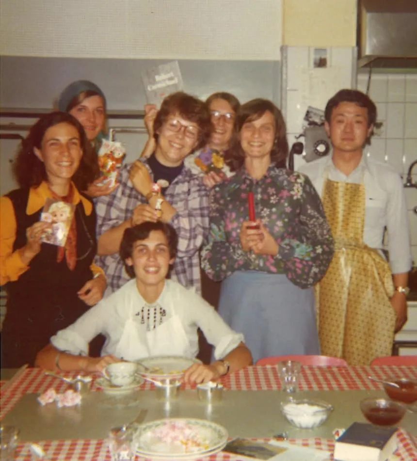 1975 At the international conference center in Caux, Switzerland, participants help with cooking and dishwashing