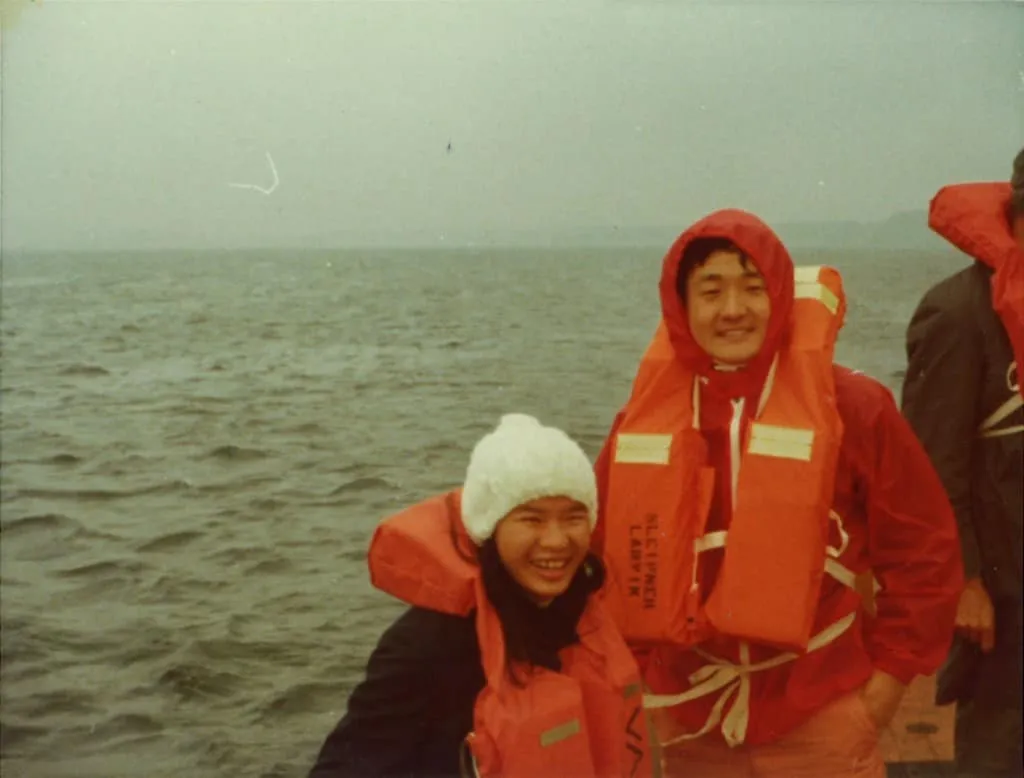 1976 Off the coast of Norway in strong winds, with Phong, a Vietnamese refugee, on the left
