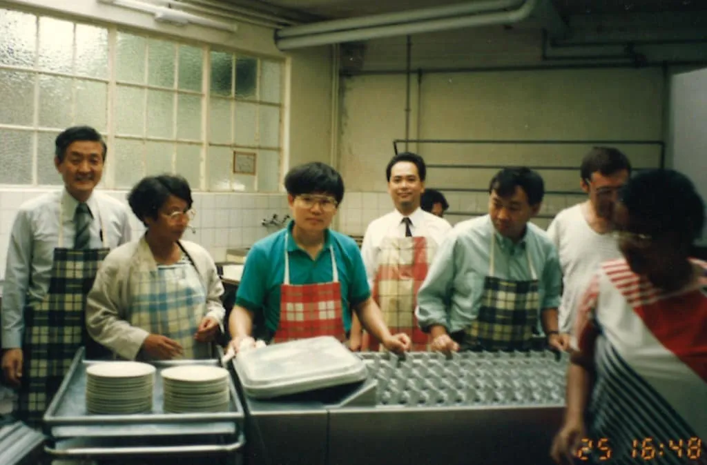1994 Washing dishes together with former Cambodian Foreign Minister Sirivudh (second from right) at the MRA conference in Switzerland